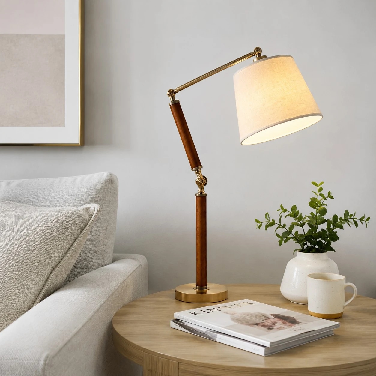 Warm fabric shade table lamp on a living room side table